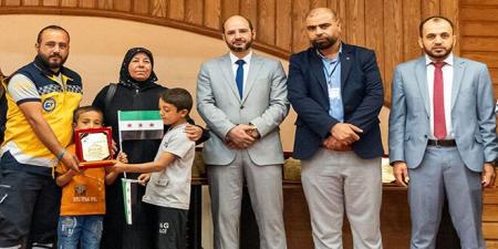 نقابة الممرضين في حماة تكرم ذوي شهداء الكادر الطبي