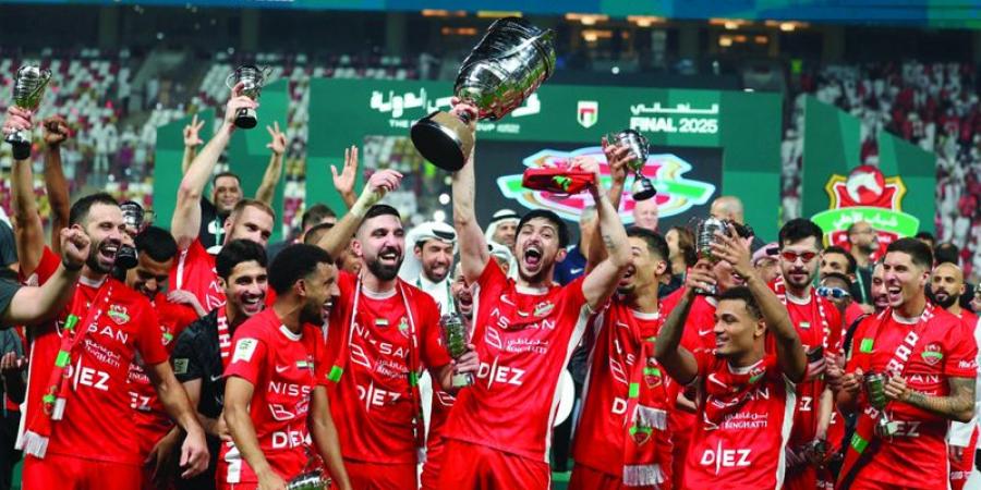 شباب الأهلي يزف «الكأس 11» من أبوظبي إلى دبي