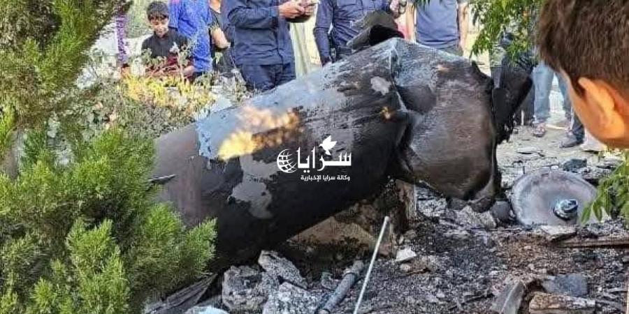 بالصور .. سقوط شظايا جسم طائر في مادبا دون وقوع إصابات